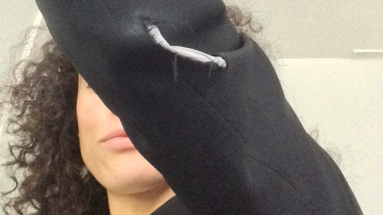 Lizzie Brown tears jacket after dramatic hand gestures in court